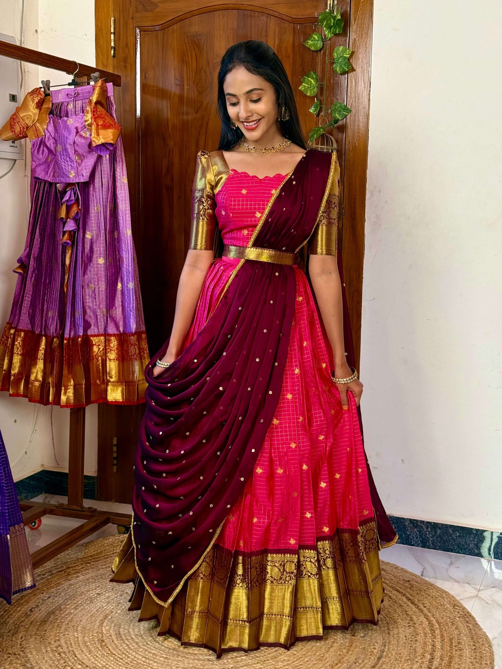 Kanmani Rani pink and dark wine lehenga