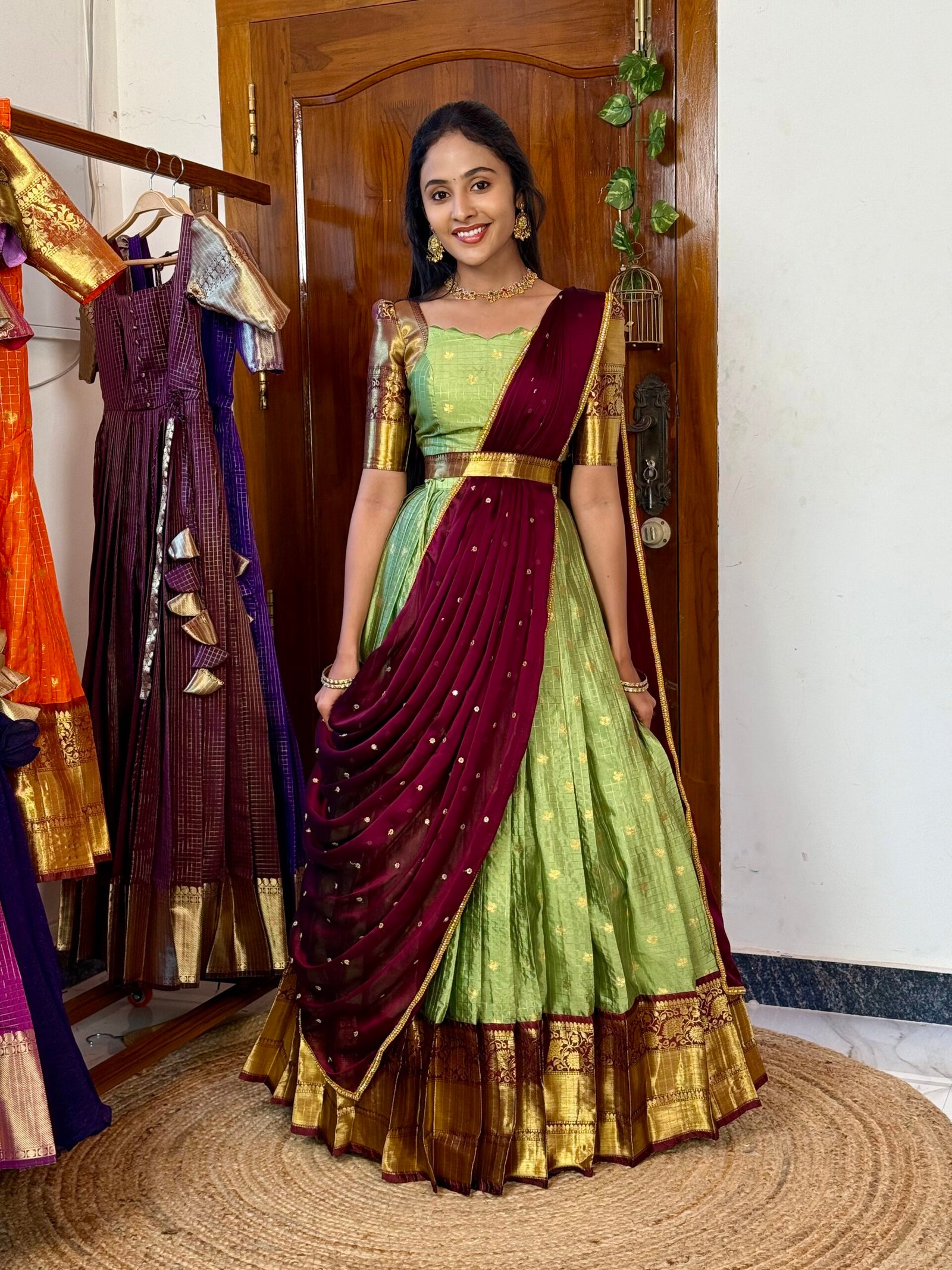 Kanmani Green and dark wine lehenga