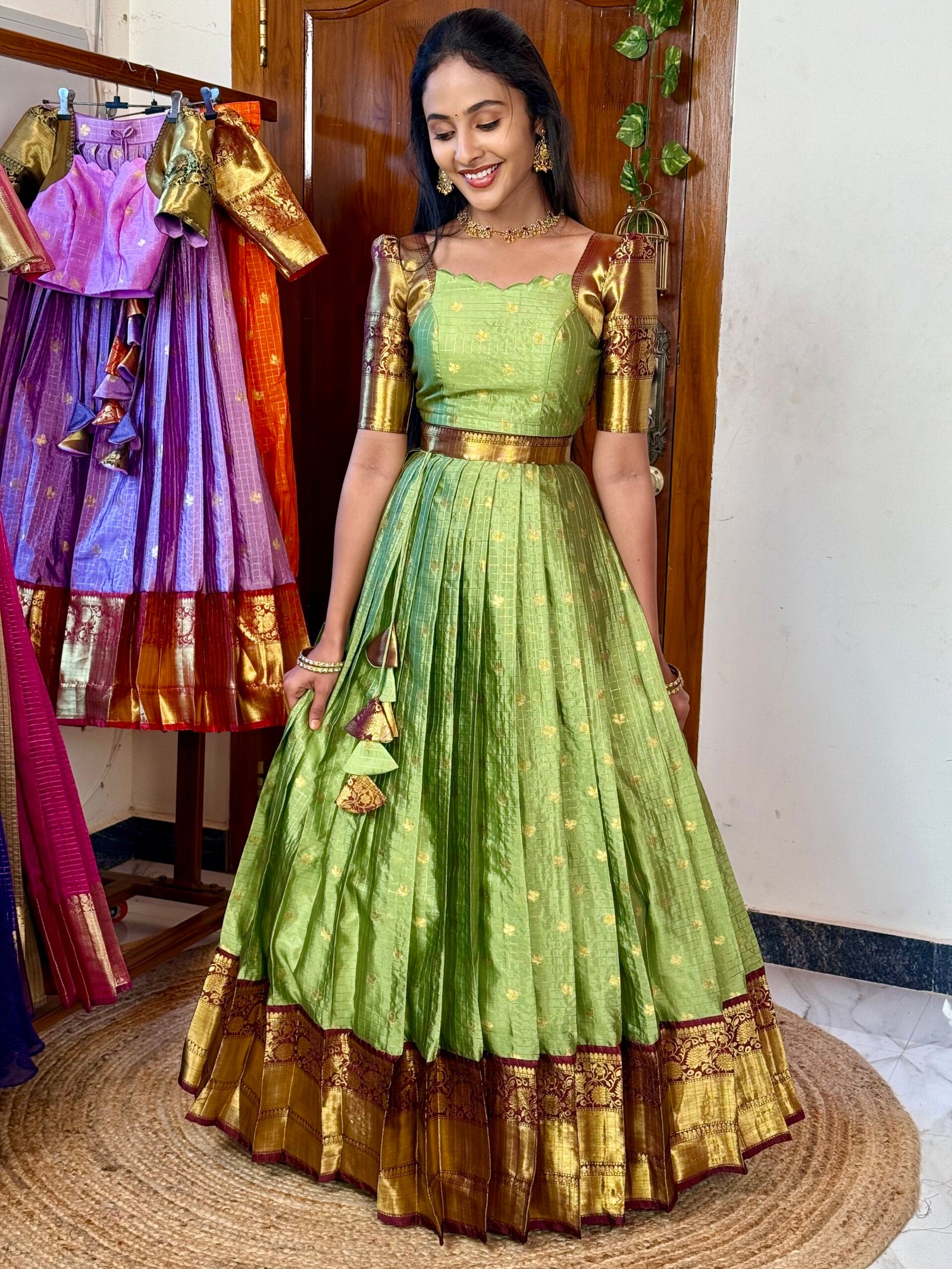 Kanmani Green and dark wine lehenga