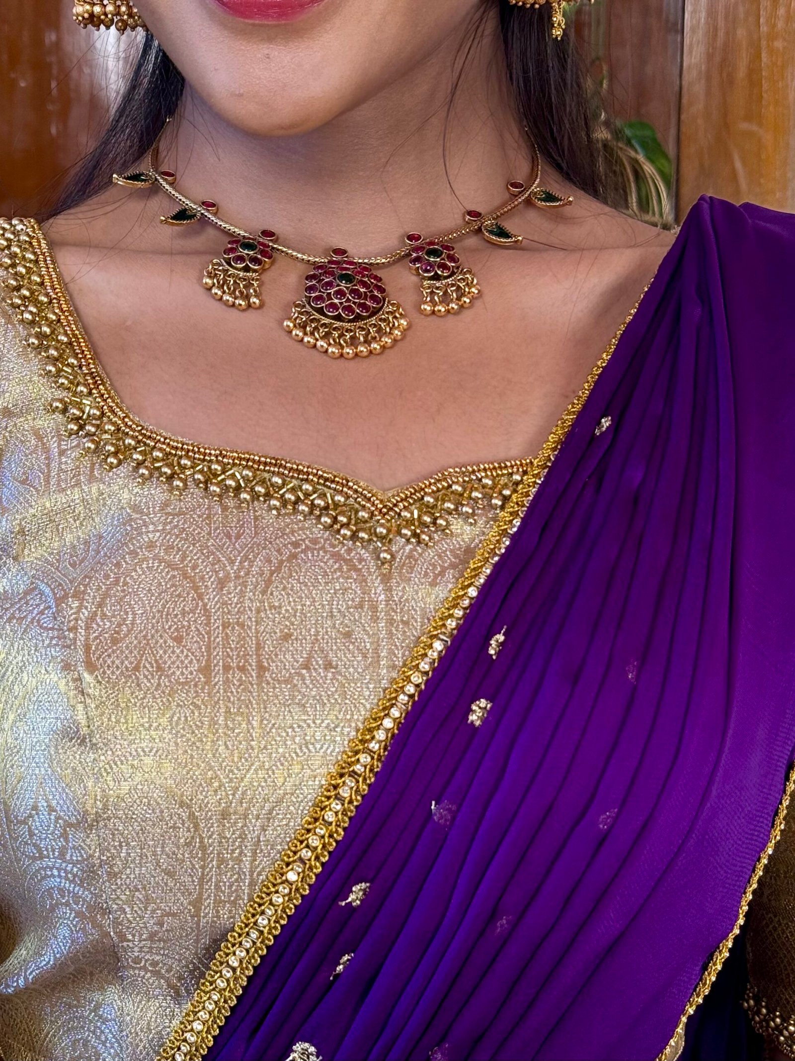 Madhuram off white and purple hand worked lehenga set